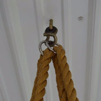 Closeup of A&L Furniture Co. Rope Kit hanging from ceiling hooks