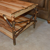 Side view of A&L Furniture Rustic Hickory Coffee Table with Shelf