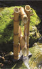 Aquascape® Bamboo Deer Scarer Spitter in a tranquil garden