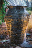 Water cascading over Aquascape®  Stacked Slate Fountain Urn