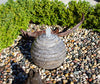 Smooth Ribbed Water feature. Pure water cascading down music to the ears and eyes.