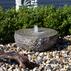 Beautiful natural stone water fountain adds elegance to your garden and water for your  feathered friends.