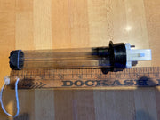 A UV bulb designed for an Anjon BP-2000H filter, lying on a wooden surface, measured alongside a ruler for scale.