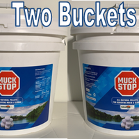 Two Muck Stop buckets side by side on a white background