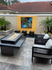 Outdoor patio with fire pit table, chairs, and 3 Heiho Cube Fountain Kits .