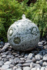 Green Marble Sphere Fountain 24" in Dia.  Stationed in rock and plant garden.