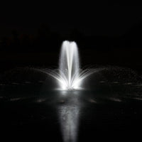 Airmax® EcoSeries™ 1/2 HP Floating Fountain, Shown at night with Classic Pattern and LED Lighting