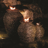 Aquascape®  Stacked Slate Fountain Urns illuminated by Fire Add-On Kit