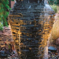 Water cascading over Aquascape®  Stacked Slate Fountain Urn