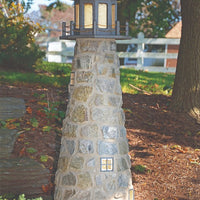 Amish-Made Stone Faced Lighthouses with Interior Lighting under a tree