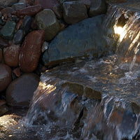 Pond Boss® Landscape and Fountain 3-Light Set in a waterfall