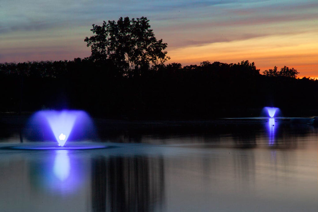 Scott Aerator Color-Changing Fountain Lighting Set illuminating fountain in blue light